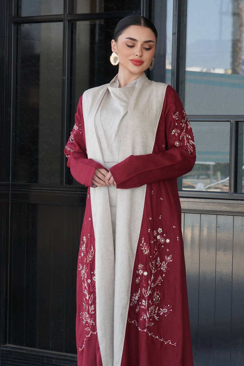 عباية لينن باللون العنابي مع شك يدوي . C:6753