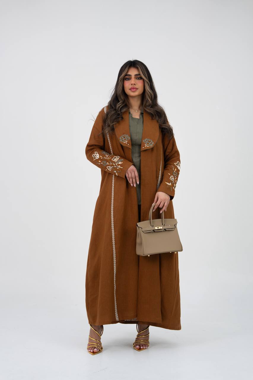 Camel-colored linen trench coat with hand embroidery and beading. C:6768