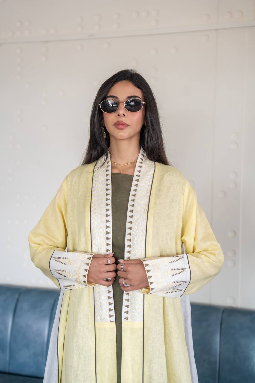 Abaya made of butter yellow linen fabric with embroidery. C:6778