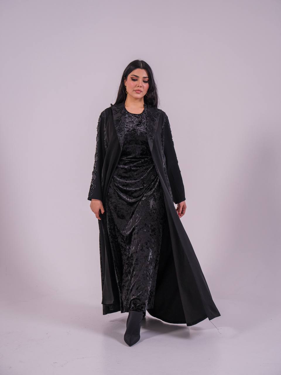 Crepe blazer abaya with black printed crepe and hand-stitched details.C:6733