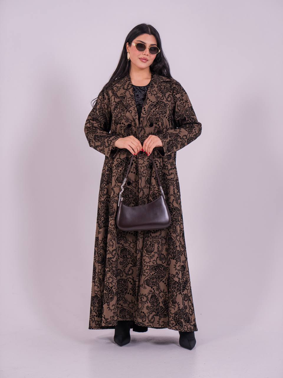 A brown abaya made of crepe fabric with a velvet print.C:6732