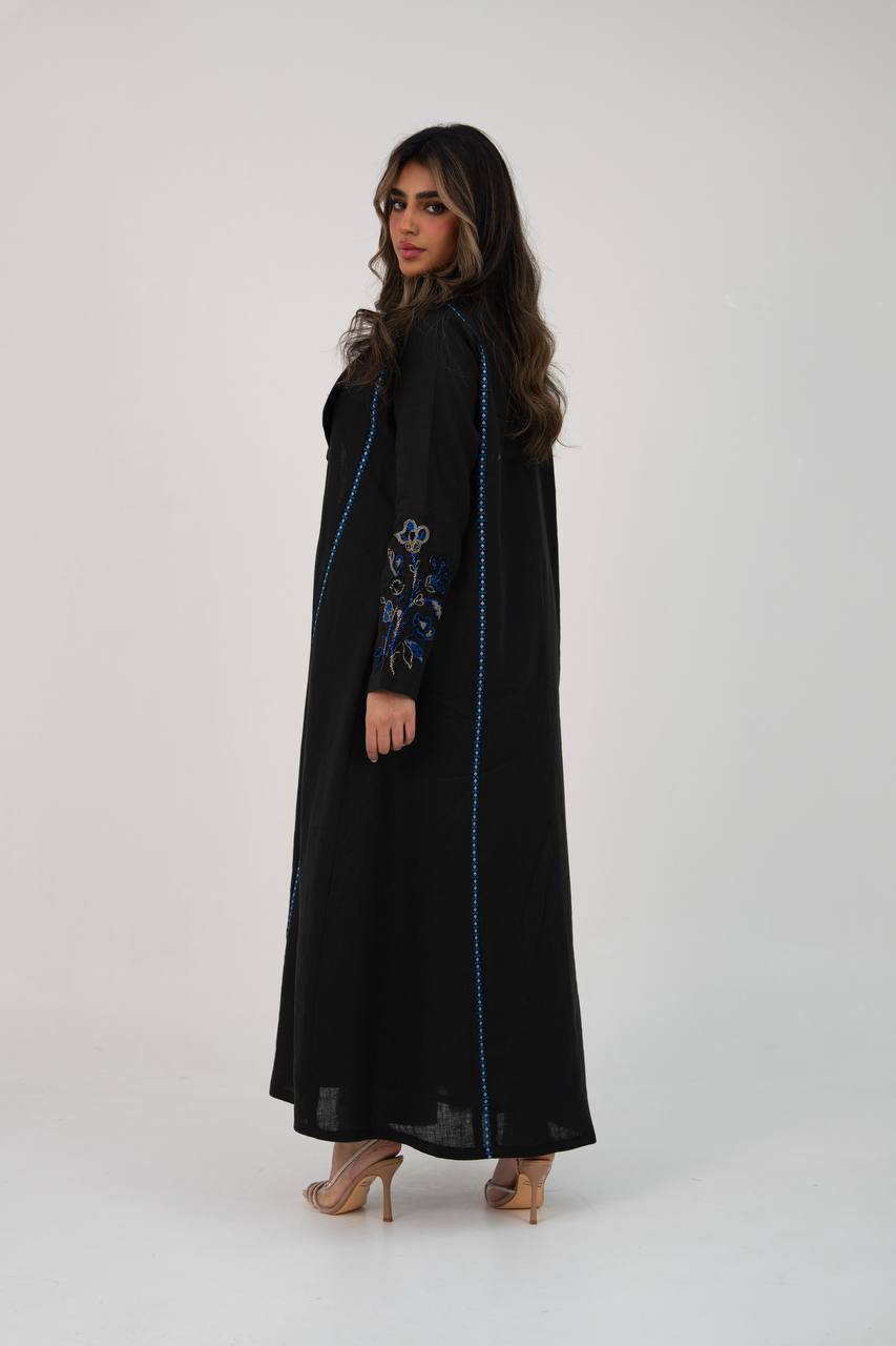 Black linen trench coat with hand embroidery and beading. C:6768