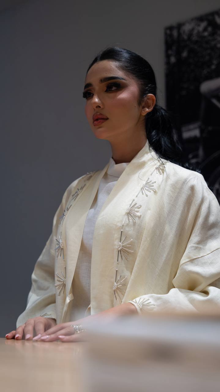 Yellow linen abaya with hand-stitched details. C:6790