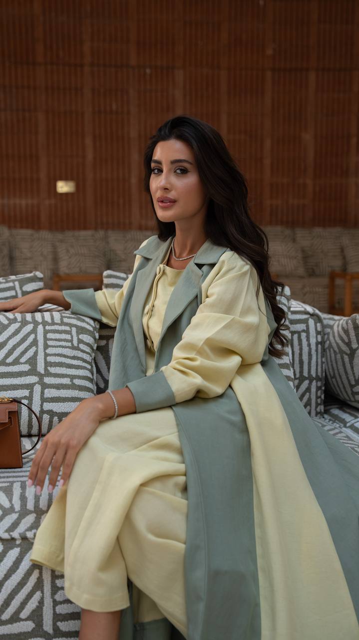 Linen abaya in yellow and pistachio green with hand-stitched details.C:6798