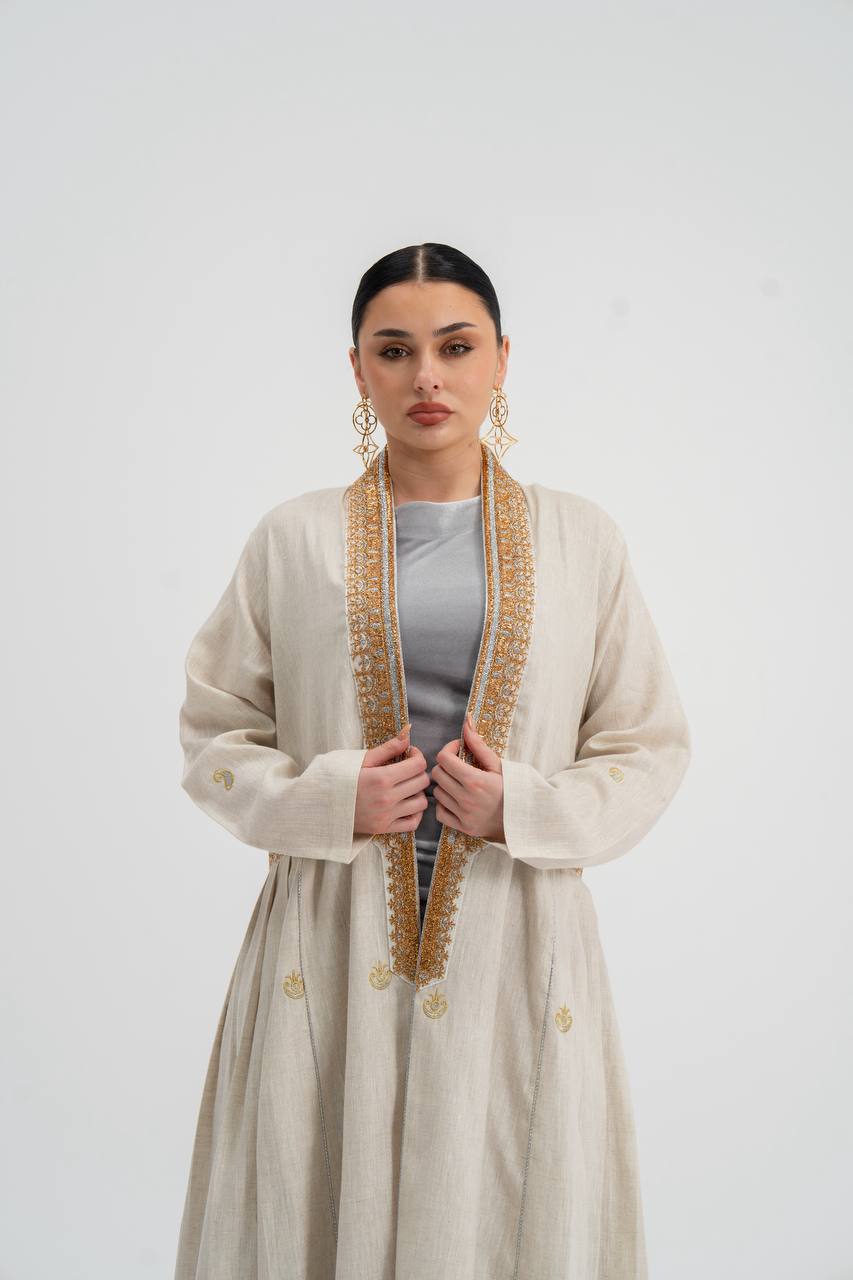 Linen abaya in light beige with embroidery. C:6745