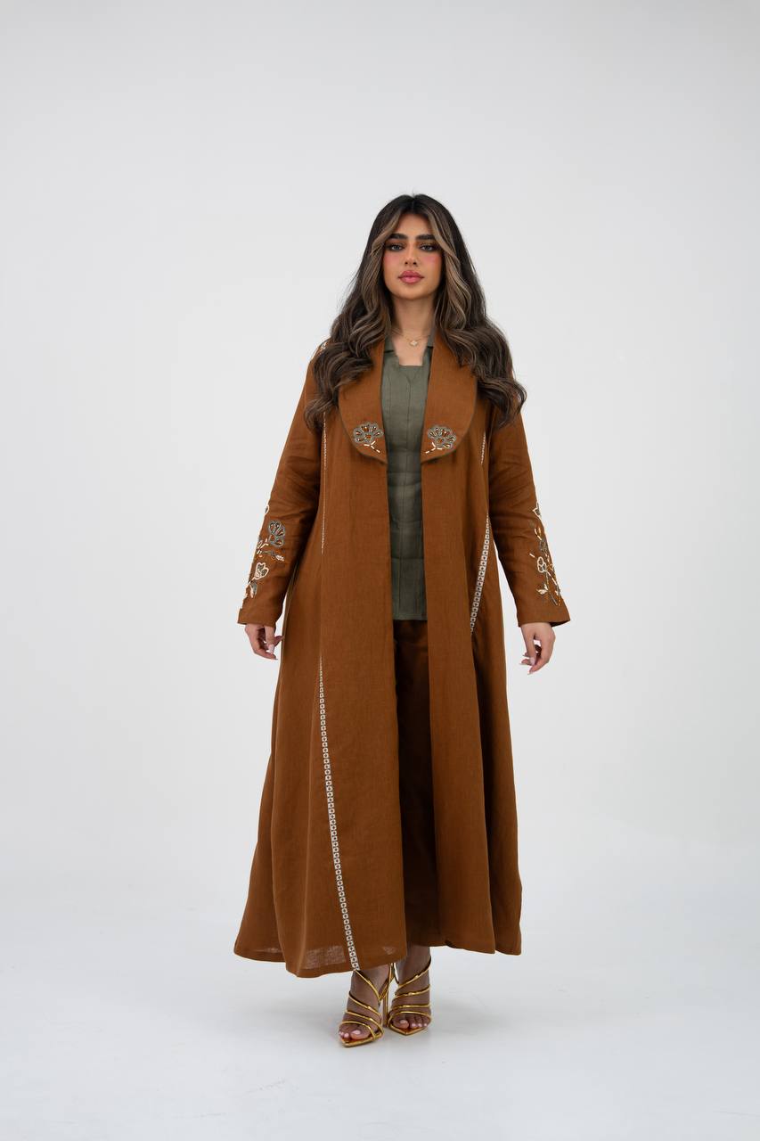 Camel-colored linen trench coat with hand embroidery and beading. C:6768