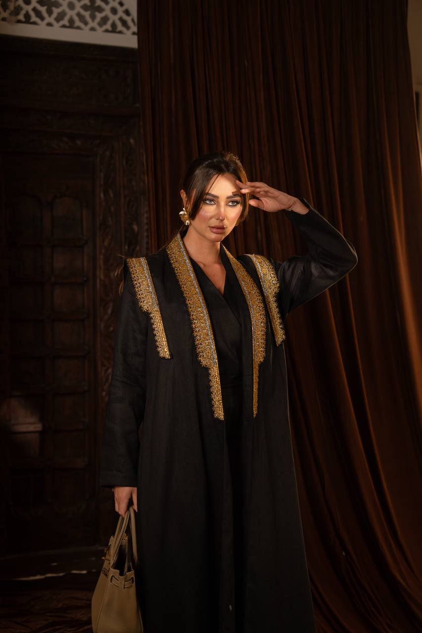 Linen abaya in black with embroidery. C:6762