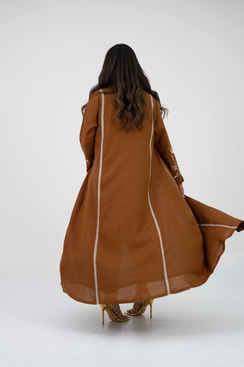 Camel-colored linen trench coat with hand embroidery and beading. C:6768