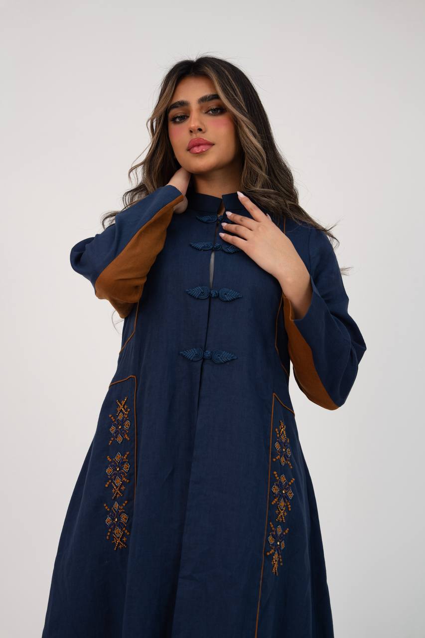 Linen abaya in navy blue with hand-stitched details. C:6766