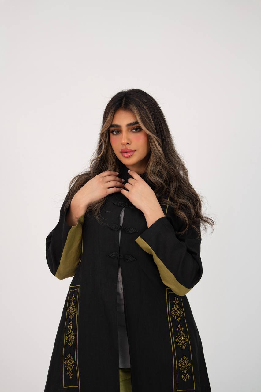 Linen abaya in black with hand embroidery. C:6766