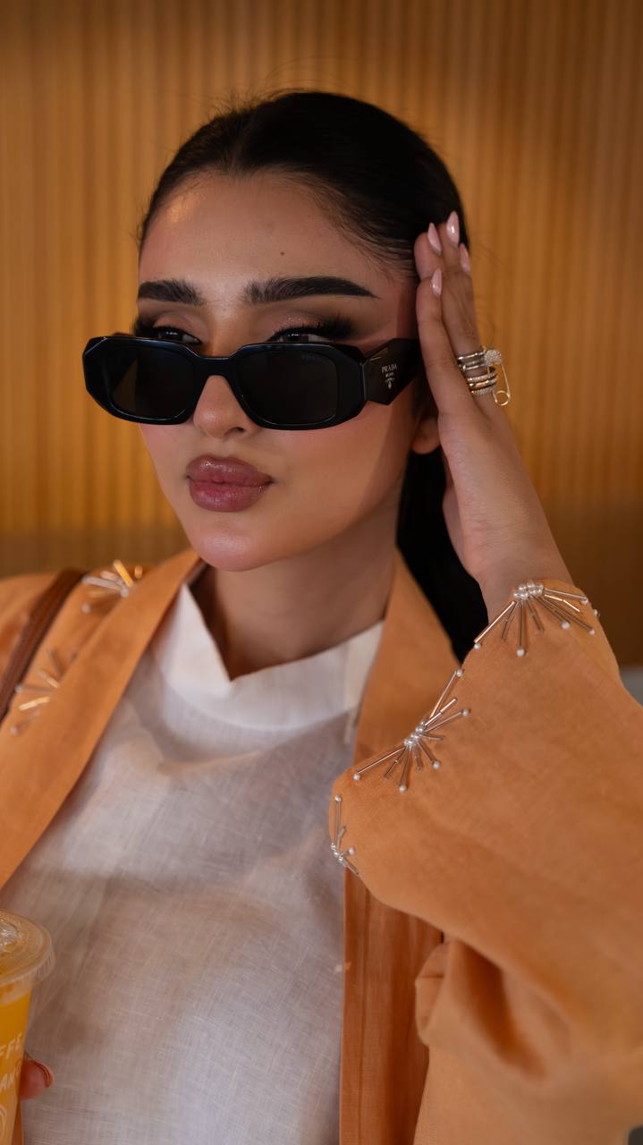 Linen abaya in orange with hand embroidery. C:6790 Oranges