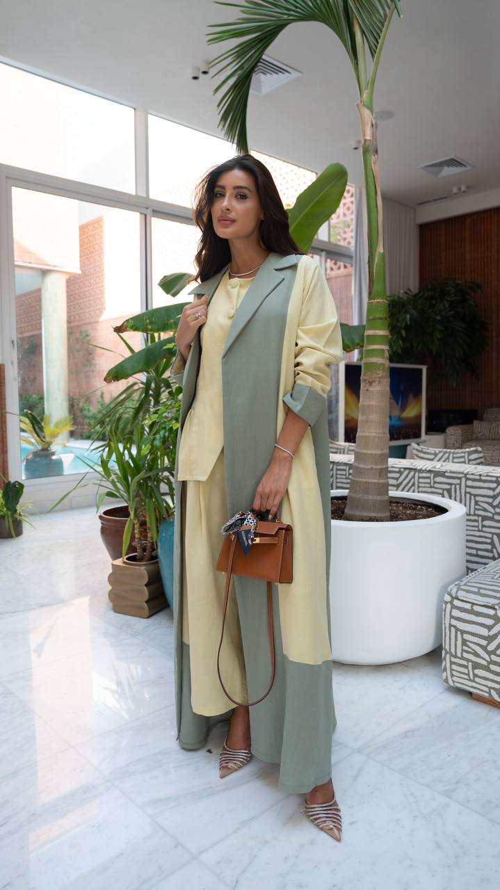 Linen abaya in yellow and pistachio green with hand-stitched details.C:6798