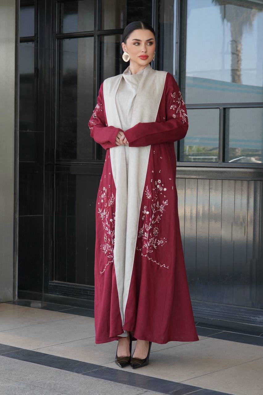 Burgundy linen abaya with hand-stitched details. C:6753