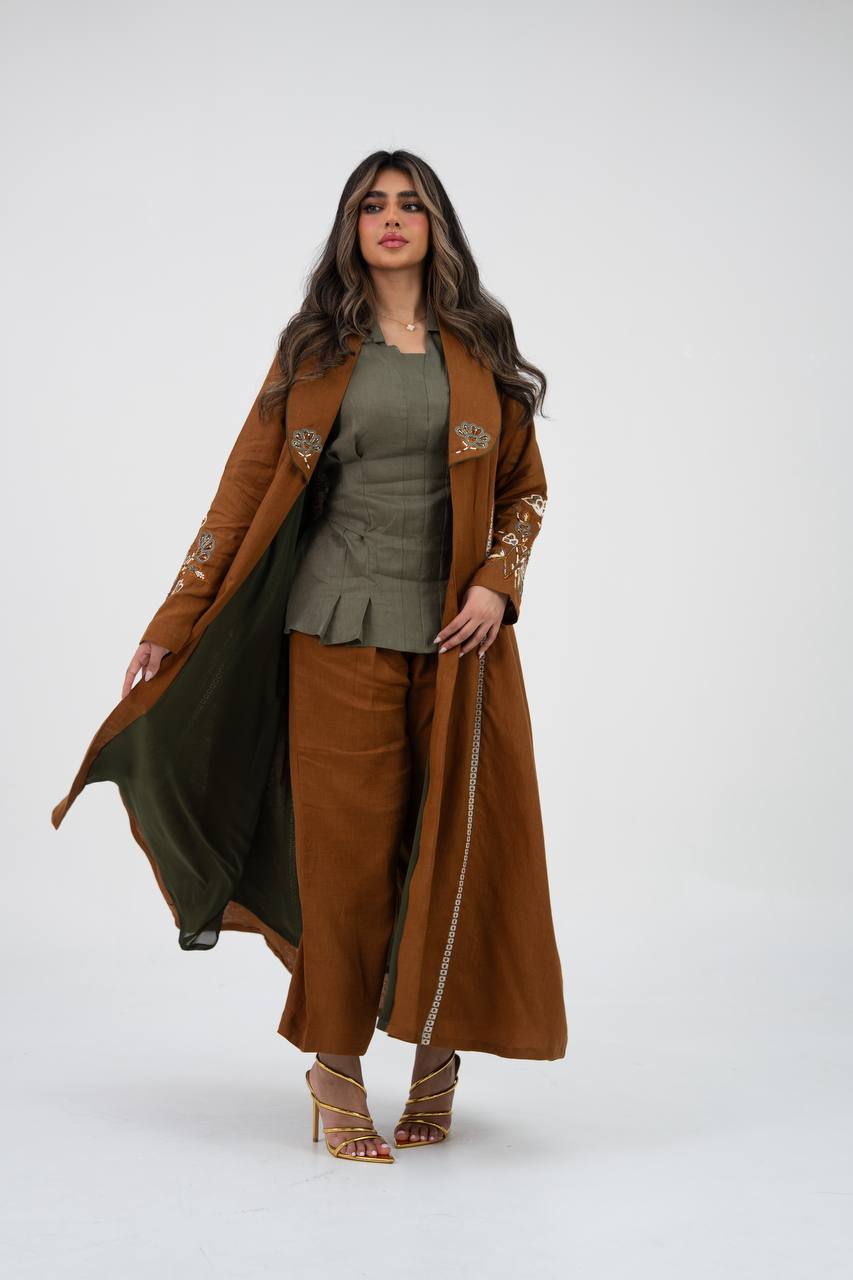 Camel-colored linen trench coat with hand embroidery and beading. C:6768
