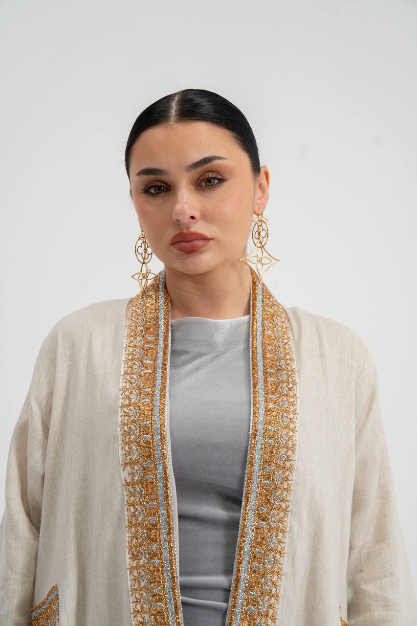 Linen abaya in light beige with embroidery. C:6745