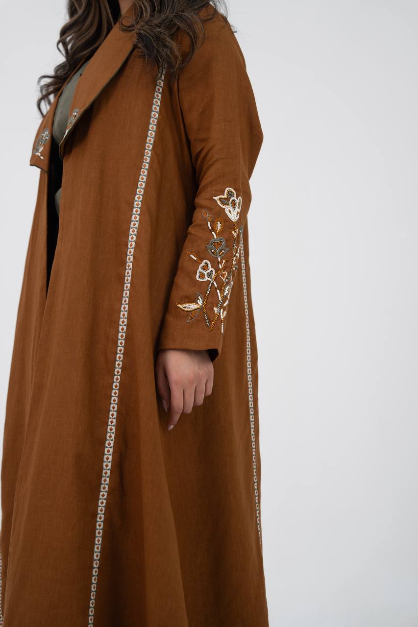 Camel-colored linen trench coat with hand embroidery and beading. C:6768